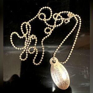 Tiffan silver long necklace. Like new!, never worn. Kept in jewelry box